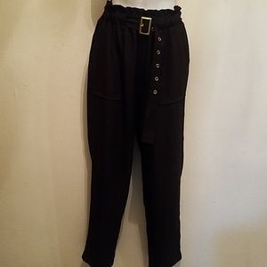 Black pants elastic on the waist with belt.